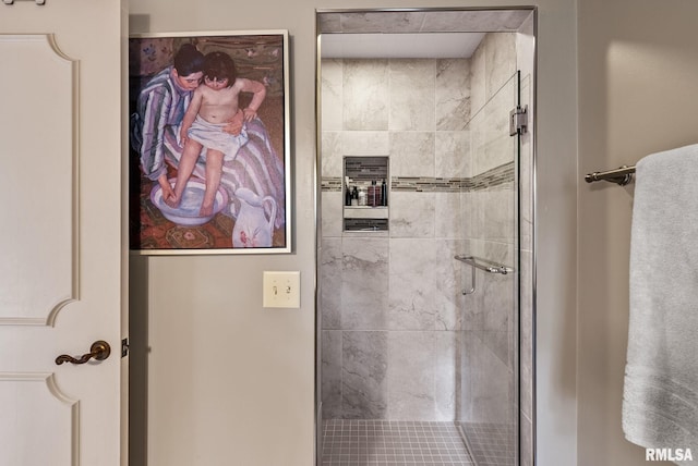 full bath featuring a shower stall