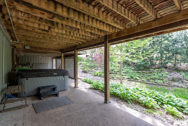 view of patio / terrace with a hot tub