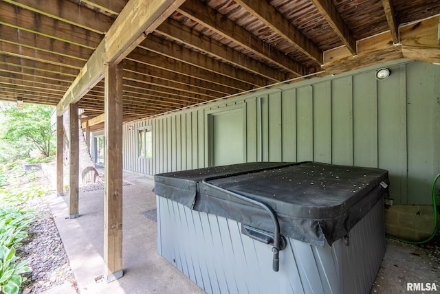 view of patio / terrace with a hot tub