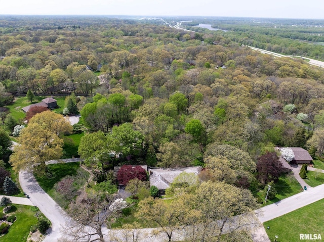 drone / aerial view with a view of trees