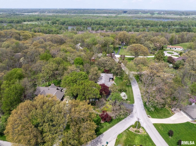 aerial view with a wooded view