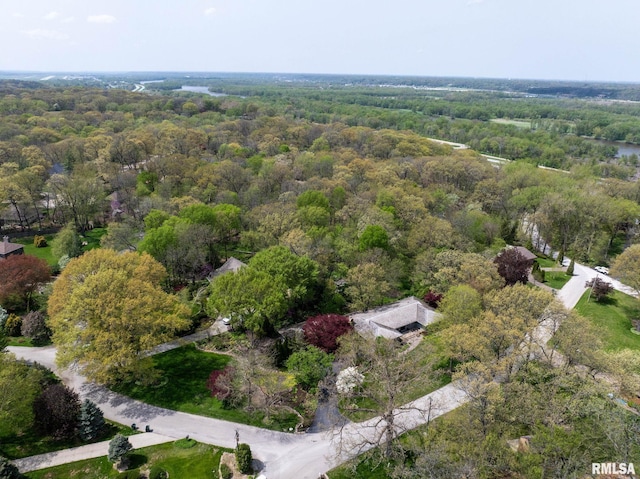 drone / aerial view with a view of trees