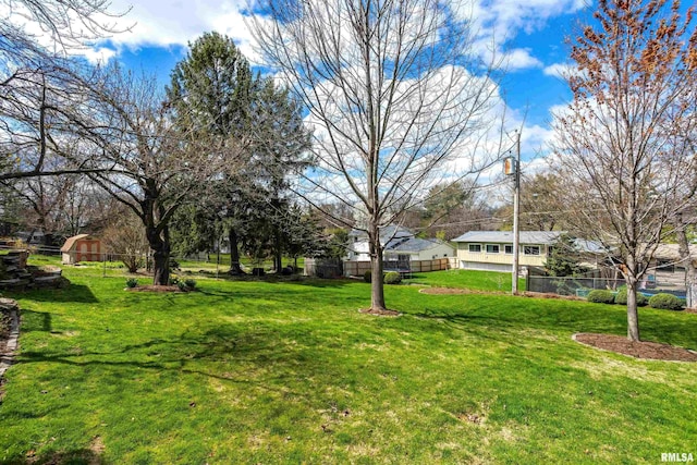 view of yard featuring fence