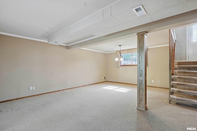 below grade area with visible vents, crown molding, carpet floors, baseboards, and stairway