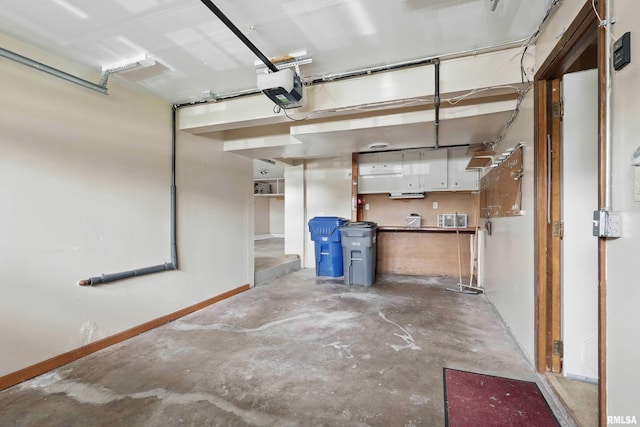 garage featuring a garage door opener