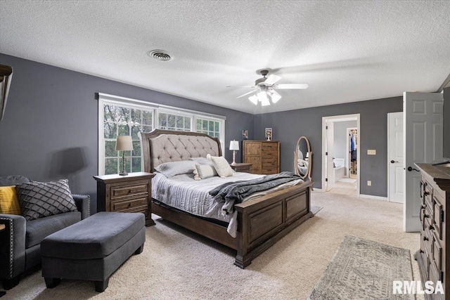 bedroom featuring ceiling fan, light colored carpet, a textured ceiling, baseboards, and visible vents