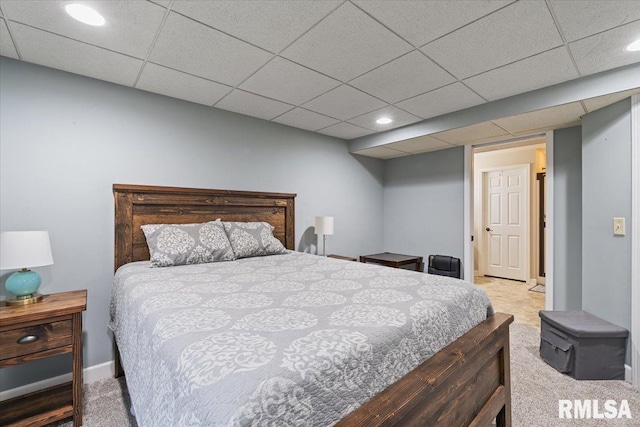 bedroom featuring carpet flooring, recessed lighting, and a paneled ceiling