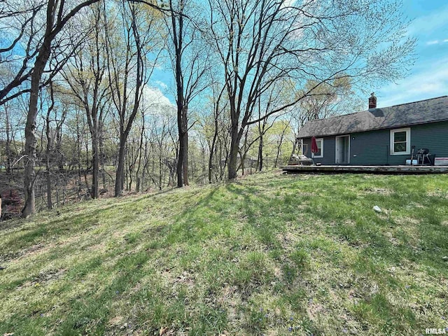 view of yard with a deck
