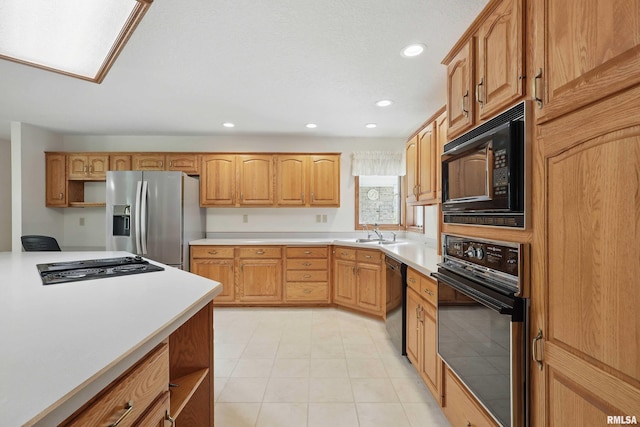 kitchen with light countertops, open shelves, black appliances, and recessed lighting
