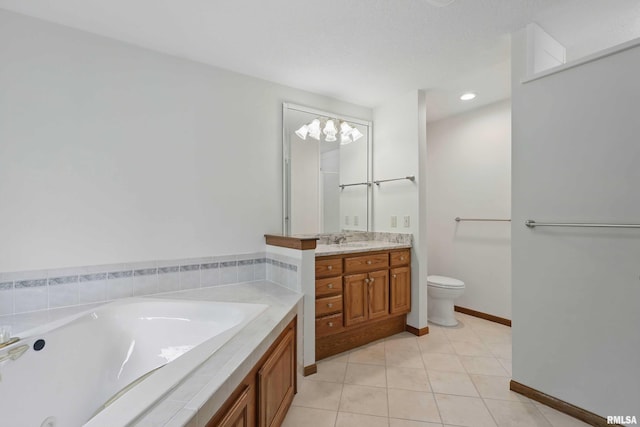 full bath featuring vanity, tile patterned floors, a bath, and toilet