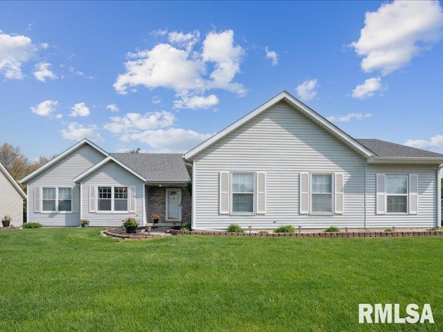 single story home with a front yard