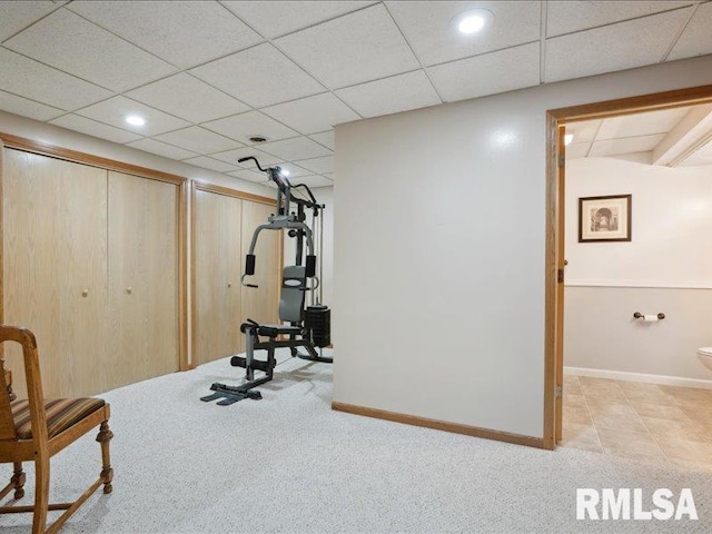 exercise area with carpet floors, baseboards, and recessed lighting