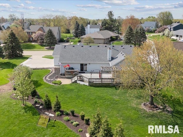 birds eye view of property with a residential view