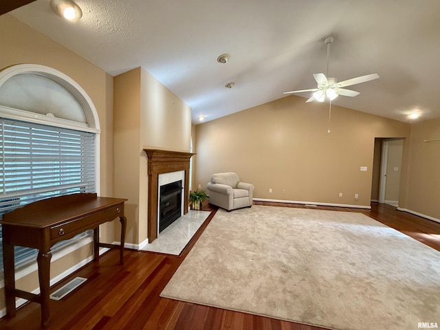 106 Jeremy Dr, Carterville, IL 62918 - living area featuring a ceiling fan, lofted ceiling, wood finished floors, and a premium fireplace