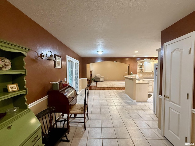 106 Jeremy Dr, Carterville, IL 62918 - interior space featuring light tile patterned floors and a textured ceiling
