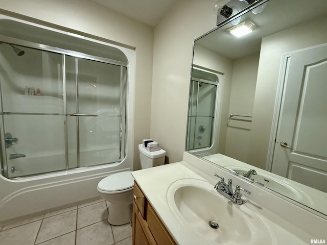 106 Jeremy Dr, Carterville, IL 62918 - full bathroom with shower / bath combination with glass door, toilet, tile patterned flooring, and vanity