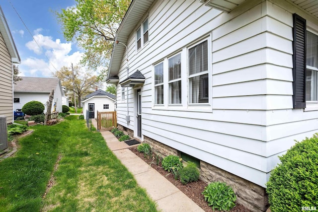 view of home's exterior featuring a lawn