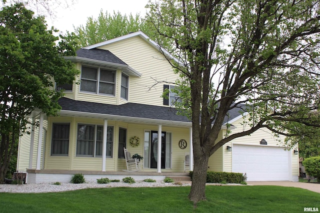 view of front of property featuring a garage, a front lawn, a shingled roof, a porch, and driveway
