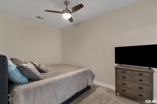 1824 S 5th St, Eldridge, IA 52748 - carpeted bedroom with a ceiling fan, baseboards, and visible vents