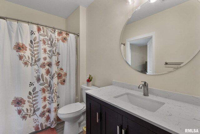 1824 S 5th St, Eldridge, IA 52748 - bathroom featuring vanity, a shower with shower curtain, and toilet