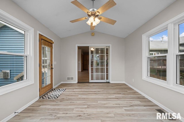 unfurnished sunroom with visible vents