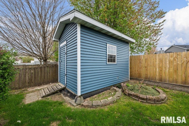 view of shed featuring a fenced backyard