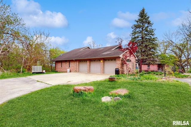 view of property exterior featuring brick siding, a garage, a lawn, and driveway