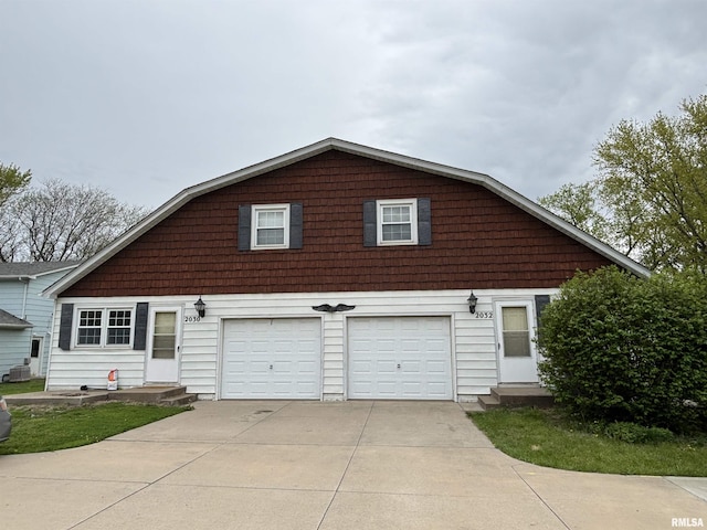 view of front of home with concrete driveway