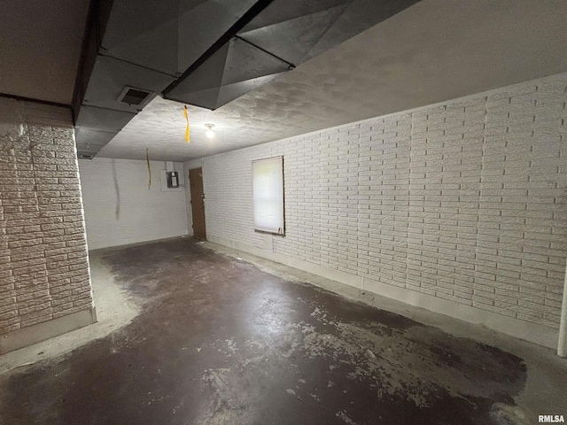 unfinished basement featuring visible vents