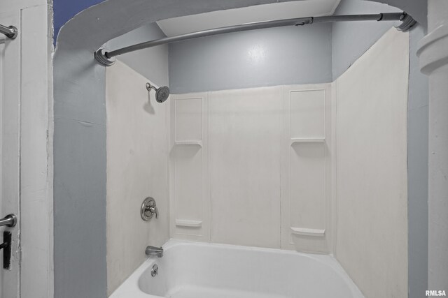 full bathroom featuring  shower combination
