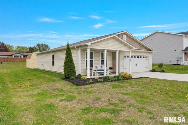 ranch-style house featuring a garage, covered porch, concrete driveway, and a front yard