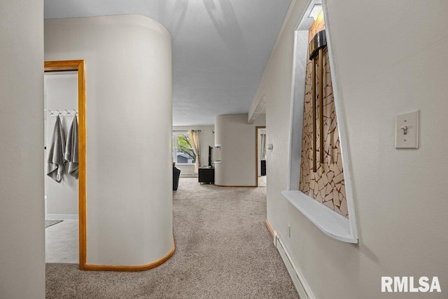 corridor with carpet flooring