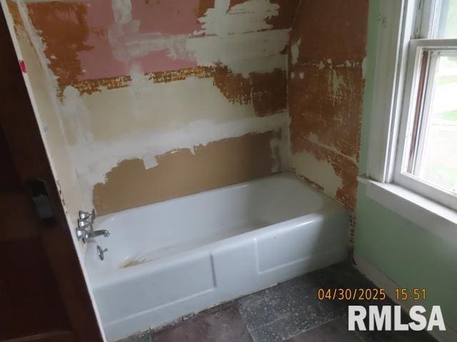 bathroom with a bath
