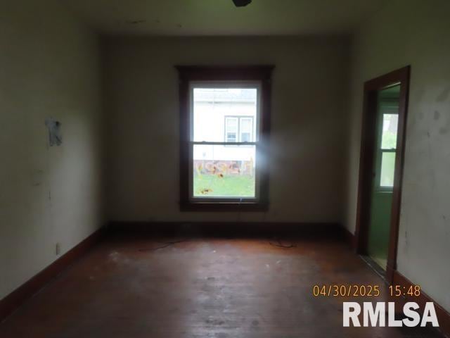 empty room with baseboards