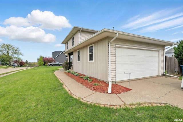view of property exterior featuring concrete driveway, a lawn, and a garage
