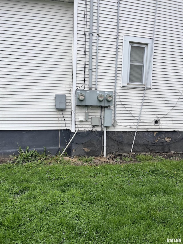 view of property exterior with a lawn