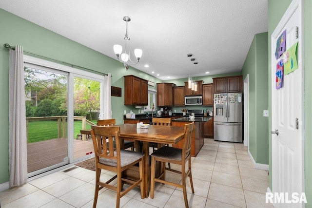 dining area featuring visible vents, light tile patterned floors, baseboards, an inviting chandelier, and recessed lighting