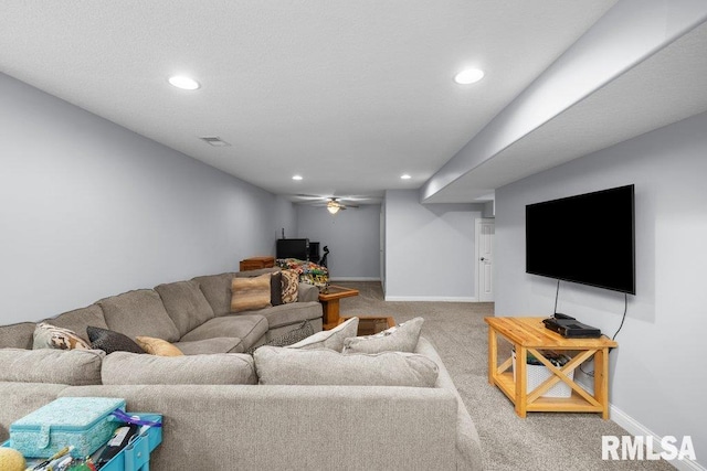 carpeted living room featuring visible vents, recessed lighting, baseboards, and a ceiling fan