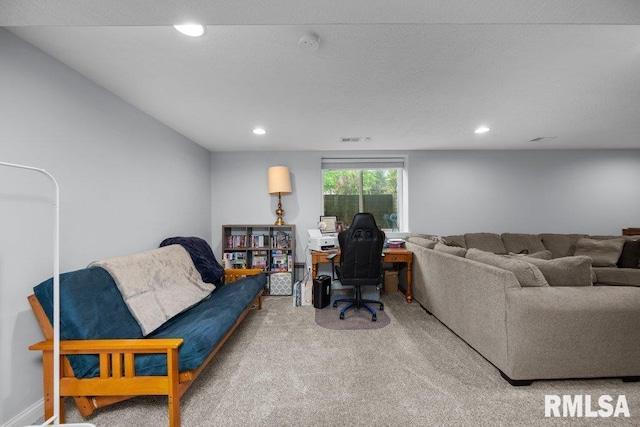 living area with carpet floors, recessed lighting, and visible vents