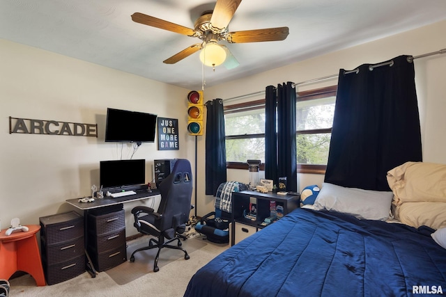 carpeted bedroom featuring ceiling fan