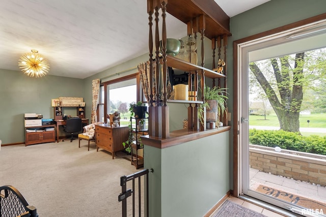 interior space featuring baseboards