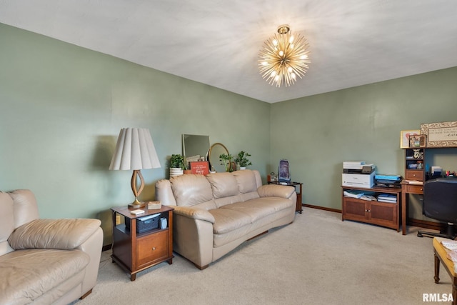carpeted living area featuring baseboards and a chandelier