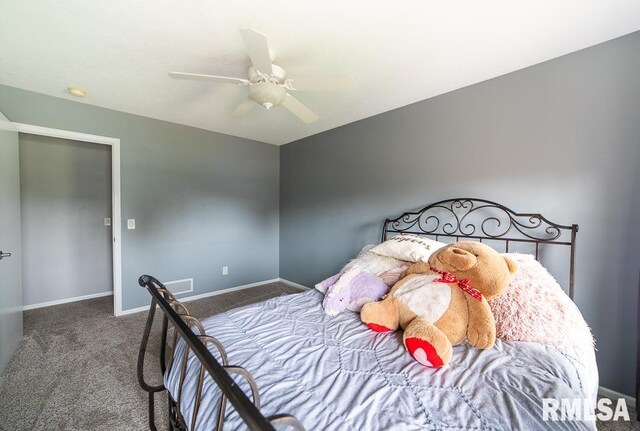 bedroom featuring carpet floors, baseboards, and ceiling fan