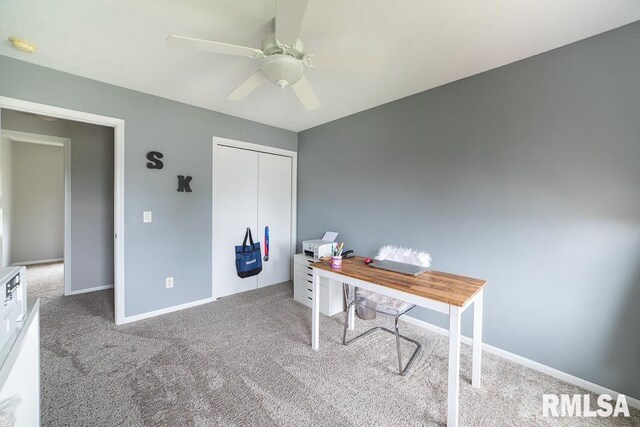 office with carpet flooring, a ceiling fan, and baseboards