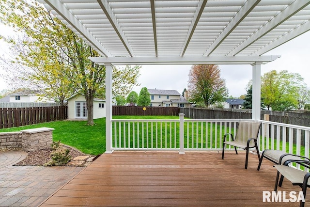 deck with an outdoor structure, a fenced backyard, a yard, and a pergola