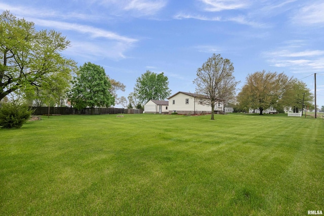view of yard featuring fence