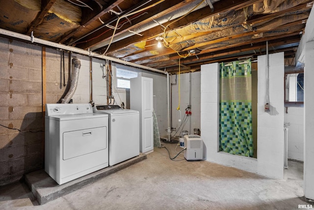 basement featuring separate washer and dryer