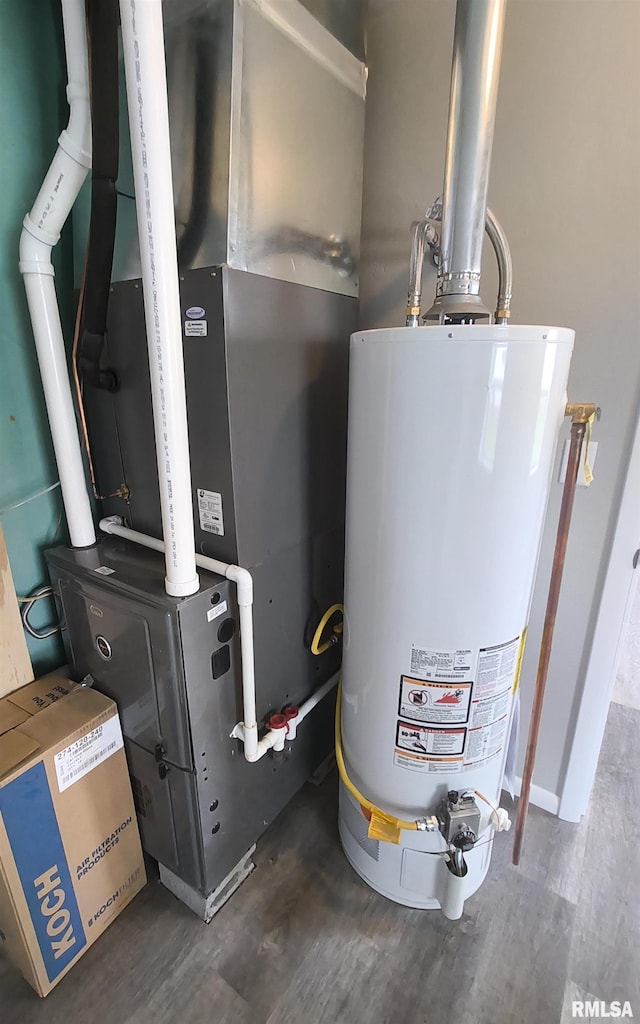 116 Ballantine St, Duquoin, IL 62832 - utility room with gas water heater and heating unit