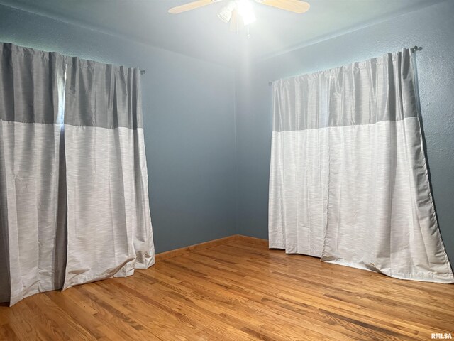 2000 W Gray Dr, Carbondale, IL 62901 - empty room featuring ceiling fan and wood finished floors