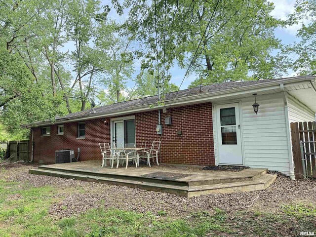 2000 W Gray Dr, Carbondale, IL 62901 - rear view of property with brick siding, a deck, and fence